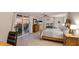 Inviting bedroom with balcony access, water views, and coastal-themed decor, creating a relaxing retreat at 1212 Benjamin Franklin Dr # 909, Sarasota, FL 34236