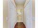Hallway access to closets and primary bathroom at 12815 24Th Street E Cir, Parrish, FL 34219