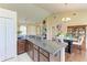Open kitchen featuring an eat-in breakfast nook and granite countertops at 12815 24Th Street E Cir, Parrish, FL 34219