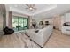 Stylish living room with a comfortable sofa, open to the kitchen and dining area at 1375 Norwalk Ter, Port Charlotte, FL 33953