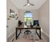 Bright and airy home office with large window and natural light at 1375 Norwalk Ter, Port Charlotte, FL 33953
