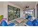 Covered patio with outdoor furniture and ceiling fan at 1375 Norwalk Ter, Port Charlotte, FL 33953