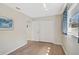 The bedroom boasts light wood floors, a window, and a spacious closet at 151 Vista Hermosa Cir # 31C, Sarasota, FL 34242