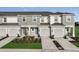 Charming townhomes with well-manicured lawns and attached one-car garages, providing comfortable and convenient living spaces at 15152 Cuzcorro Ct, Nokomis, FL 34275