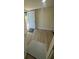 View of the entryway, showing the front door and stairs at 15233 Omaha St, Hudson, FL 34667