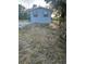 Charming single-story home featuring a classic design with neatly framed windows and a well-kept lawn at 15233 Omaha St, Hudson, FL 34667