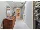 Hallway with carpet, natural light and ample storage, with a walk in closet and bathroom views at 1526 Ewing St, Nokomis, FL 34275