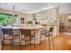 Spacious kitchen island featuring granite countertops, seating, and ample cabinet space great for entertaining at 1526 Ewing St, Nokomis, FL 34275
