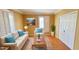 Cozy living room featuring elegant shutters, crown molding, and a neutral color palette at 1526 Ewing St, Nokomis, FL 34275