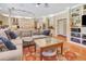 Open concept living space with modern decor and built-in shelving, offering a comfortable and inviting atmosphere at 1526 Ewing St, Nokomis, FL 34275