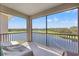 Enjoy panoramic water and golf course views from this expansive private balcony at 18114 Gawthrop Dr # 402, Bradenton, FL 34211