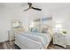 Charming bedroom featuring stylish decor and ample natural light for a cozy ambiance at 18114 Gawthrop Dr # 402, Bradenton, FL 34211