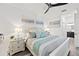A delightful bedroom featuring modern decor, accent lighting, and elegant artwork at 18114 Gawthrop Dr # 402, Bradenton, FL 34211