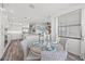 Cozy breakfast nook featuring a round table, wicker chairs, and plenty of natural light at 18114 Gawthrop Dr # 402, Bradenton, FL 34211