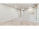 Upstairs bonus room featuring neutral walls and carpet at 1824 Woodleaf Hammock Ct, Bradenton, FL 34211