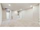 Neutral upstairs bonus room with several doorways at 1824 Woodleaf Hammock Ct, Bradenton, FL 34211