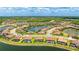 Aerial view of a waterfront home with a screened-in pool and a relaxing patio at 20359 Cristoforo Pl, Venice, FL 34293
