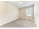 Bedroom showcasing neutral carpet, natural light, and ample space for furnishings at 207 Winding River Trl, Bradenton, FL 34212