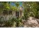 Exterior of property with garden views, brickwork, and lush landscaping at 2207 Hickory Ave, Sarasota, FL 34234