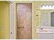 Bathroom featuring tile shower and marble countertop sink at 2371 Manheim Ave, North Port, FL 34286