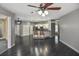 Open-concept living area with modern lighting, kitchen bar and plenty of space for entertaining and Gathering gatherings at 2371 Manheim Ave, North Port, FL 34286