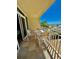 Balcony with patio seating offers beautiful views of the beach at 2412 N Gulf Dr # 119, Bradenton Beach, FL 34217