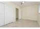 Comfortable bedroom with closet, window providing natural light and neutral decor at 2804 W Mark Dr, Sarasota, FL 34232