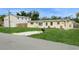 Charming single-story home with a well-maintained lawn and inviting curb appeal at 2804 W Mark Dr, Sarasota, FL 34232