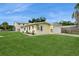 Single-story home with a well-maintained lawn and driveway at 2804 W Mark Dr, Sarasota, FL 34232