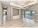 Living room featuring recessed lighting and sliding glass doors leading to an outdoor space at 3518 Recurve Cir, Sarasota, FL 34240