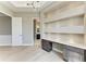 Well-designed office space with custom built-ins, marble countertops, and a neutral color palette at 3518 Recurve Cir, Sarasota, FL 34240