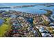 Aerial view of real estate, water, and golf course at 3521 Fair Oaks Ln, Longboat Key, FL 34228