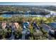 Aerial view of real estate, water, and golf course at 3521 Fair Oaks Ln, Longboat Key, FL 34228