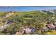 Aerial view of property showcasing green surroundings and a picturesque body of water nearby at 3619 Elm St, Ellenton, FL 34222