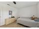 Small bedroom featuring wood-look flooring, natural light and basic furnishings at 3619 Elm St, Ellenton, FL 34222