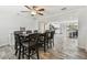 Dining Room with dark wood dining table and view of the kitchen at 3619 Elm St, Ellenton, FL 34222