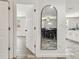 Entryway with view into a dining area featuring a black table and chair set at 3619 Elm St, Ellenton, FL 34222
