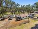 Spacious home on a well-maintained lawn with mature shade trees and fencing at 3619 Elm St, Ellenton, FL 34222