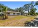 View of a single story home featuring architectural details and landscaping at 3619 Elm St, Ellenton, FL 34222