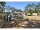 Charming single-story home with well-maintained front yard and mature trees at 3619 Elm St, Ellenton, FL 34222