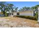 Charming single-story home with mature trees and side view at 3619 Elm St, Ellenton, FL 34222
