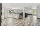 Open concept kitchen with a central island connecting the living space at 3619 Elm St, Ellenton, FL 34222