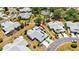 Aerial view of single Gathering home with a red pin, driveway, landscaping and neighborhood at 3662 Bonaventure Ct, Sarasota, FL 34243