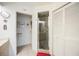 Bathroom area featuring a walk-in shower, a toilet, and a closet at 3662 Bonaventure Ct, Sarasota, FL 34243
