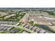 An aerial view shows property location close to ponds and community spaces with surrounding development at 3679 Santa Caterina Blvd, Bradenton, FL 34211