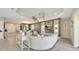 Open-concept living area showcasing elegant furnishings and seamless flow for modern living at 3679 Santa Caterina Blvd, Bradenton, FL 34211
