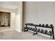 Weight room area with various dumbbells and a water fountain at 3679 Santa Caterina Blvd, Bradenton, FL 34211