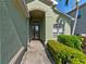 Welcoming home entrance with a beautiful door and bright sidelights, creating a warm first impression at 3740 Summerwind Cir, Bradenton, FL 34209