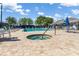 Community pool and spa with plenty of seating and umbrellas on a sunny day at 4063 Westbourne Cir, Sarasota, FL 34238