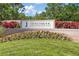 Entrance sign for Stoneybrook Golf & Country Club, with colorful flowers and manicured lawn at 4063 Westbourne Cir, Sarasota, FL 34238